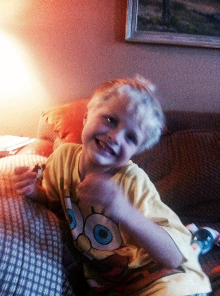 Eating chocolate donuts is a favorite activity at Paw Paw & Grammy's house!