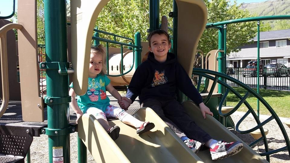 Reese & madie having fun at the playground in Park City Ut.