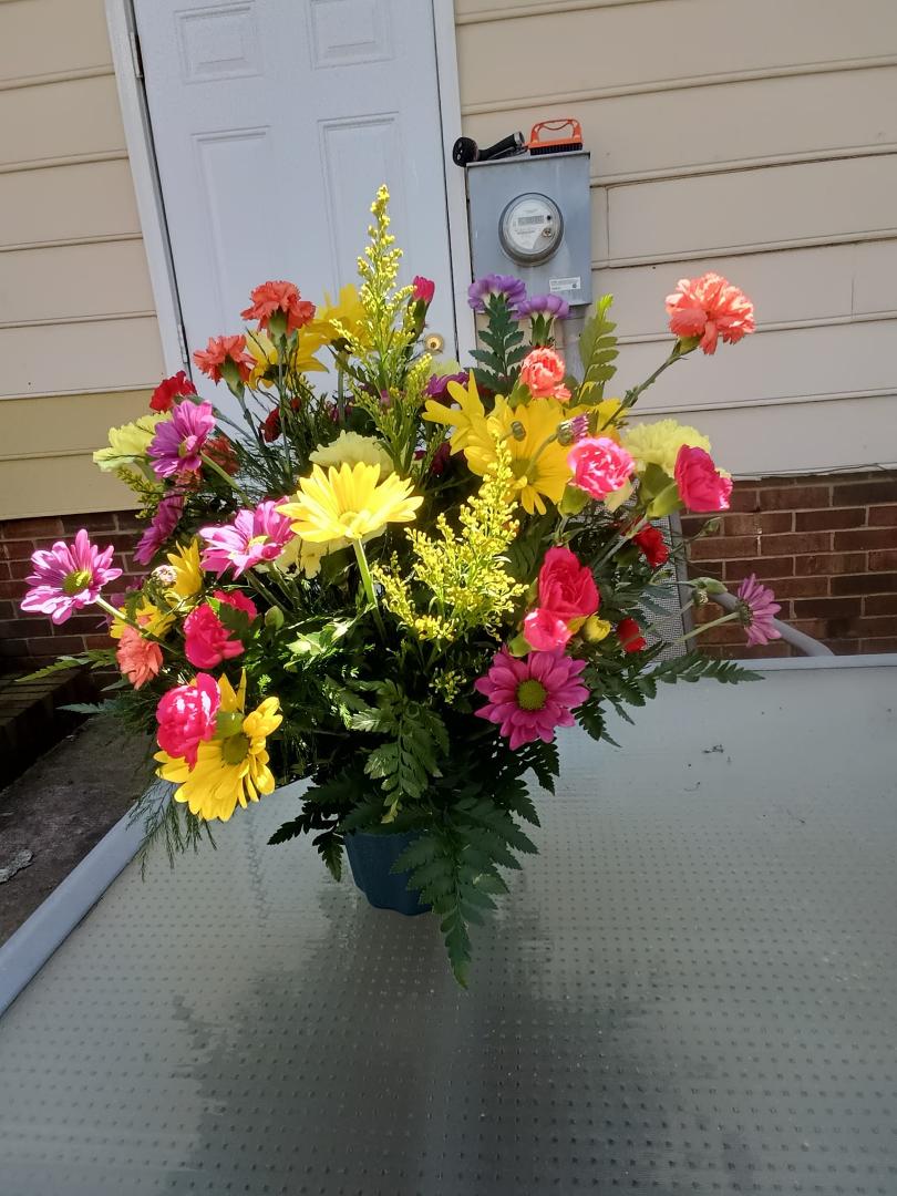 This beautiful flower arrangement was gifted to me this morning at church.