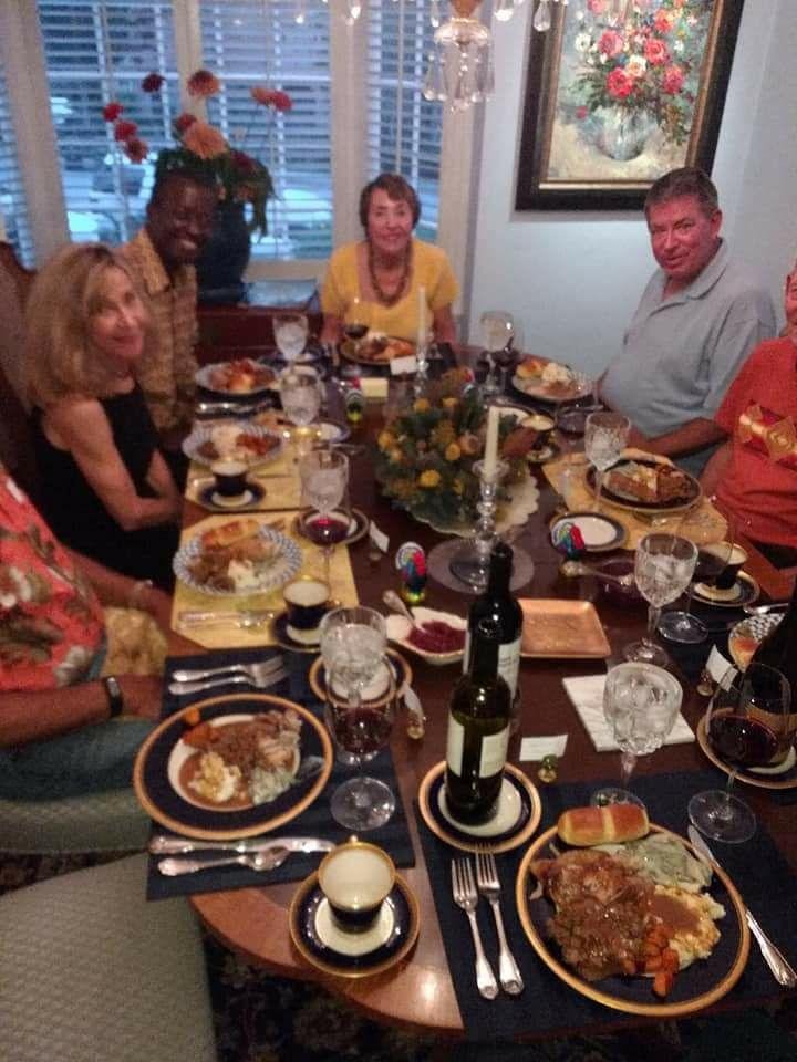Thanksgiving Day. Sitting next to my dear Ugandan friend, Kabanda Patrick.  I have been so happy/excited looking forward to this day for the last 2 months. Don't know when I will see P. again.
Thank you Scott and Kassandra 
