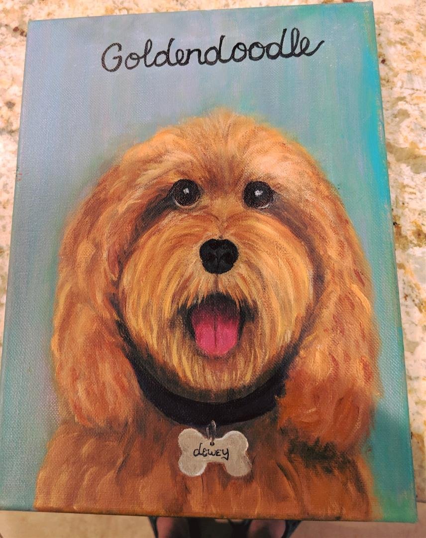Paula just finished painting a portrait of our 10 month old Puppy, Dewey.