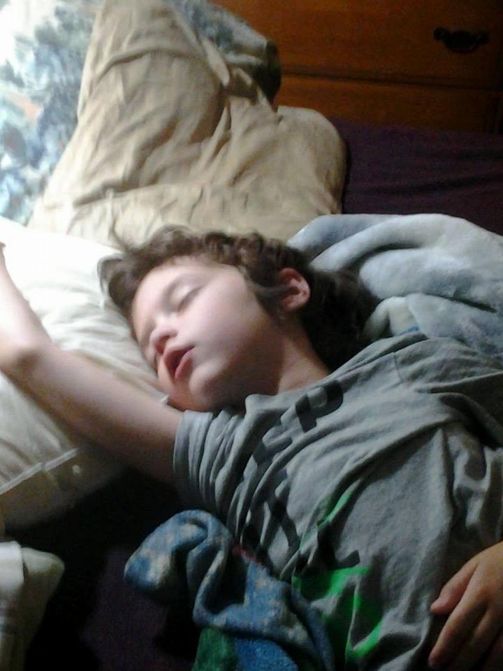 Papa's bed mate , still sleeping