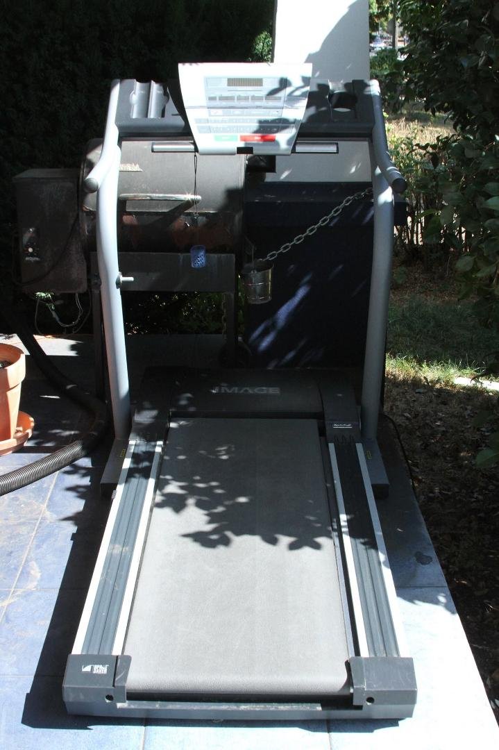 Treadmill for sale - $50 - runs great - bring a pickup and 2 big guys.....