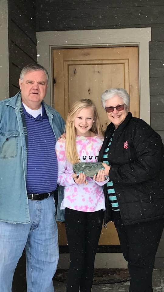 We placed a famous rock painted by our grand daughters a long time ago on the front porch of our future home in Rathdrum, Idaho!