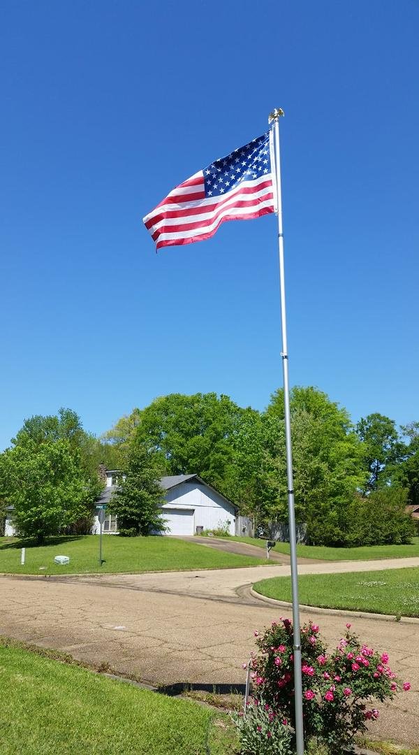 Our new flagpole,,,storm finally took the old one down,,God Bless America