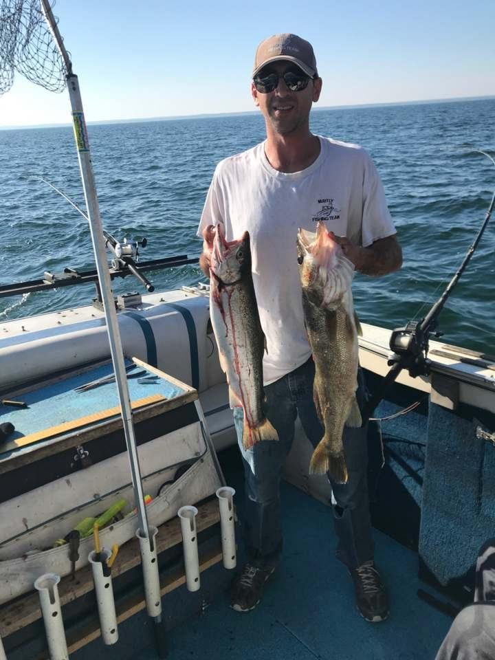 nick with his steelhead and his 29in. fish ohio walleye from wed.