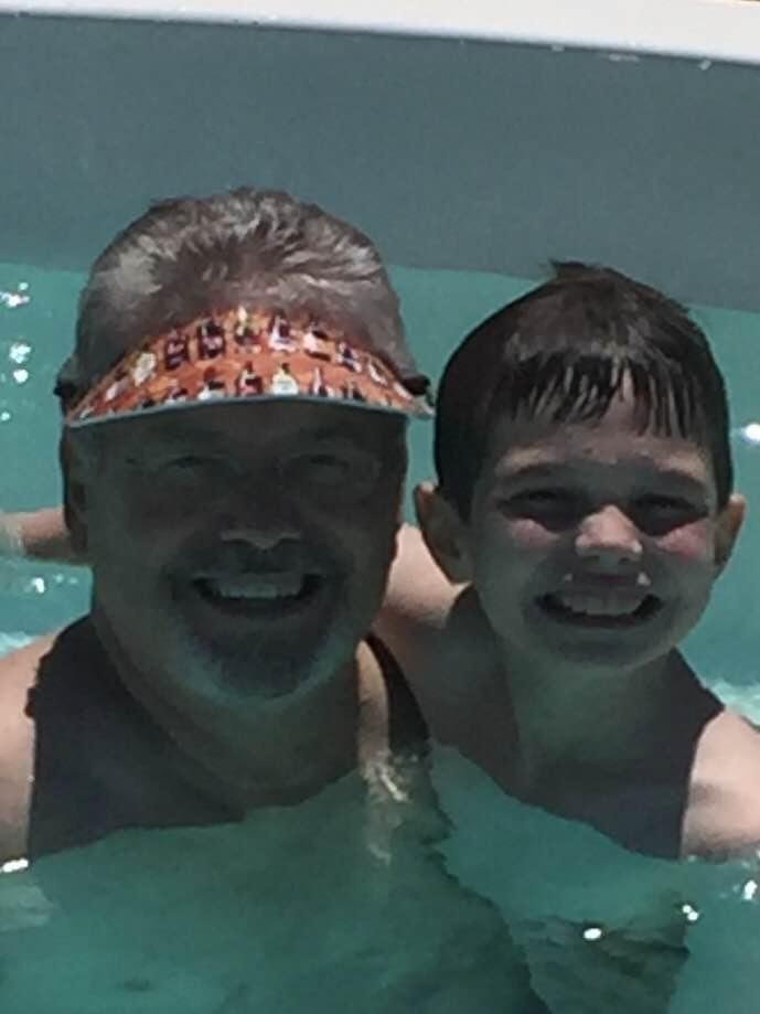 Me and my oldest grandson, Cosmo, enjoying a beautiful day in the pool...
