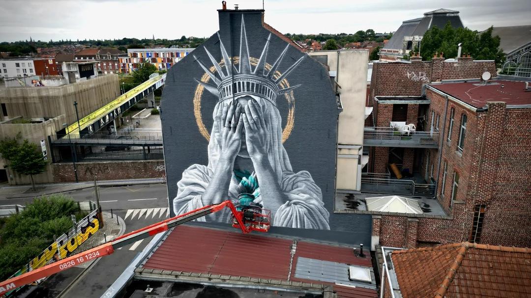 The artist is receiving significant backlash including possible loss of commissions. Speak to the truth Ms. De Leeuw it is what art is about.