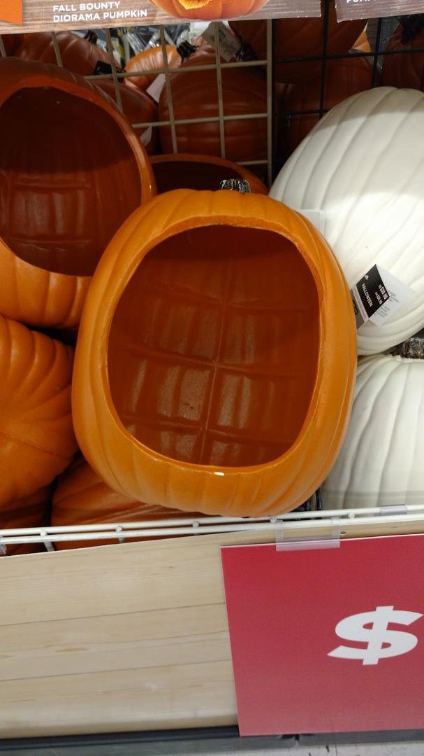 I seriously just walk into Michaels. The first thing that I see was a man pulling this pumpkin off his head and saying wow I was stuck in there, it was really stuck. Lol