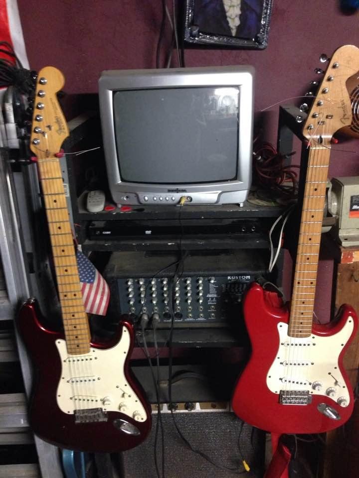 My two strats both are 1999 the one on the right is a squire I put a fender made in the USA sticker on and lacquer over on the other is a real USA made one