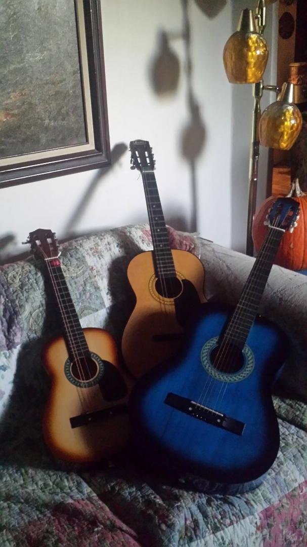 Here are three of the guitars that I'm going to give away on Jimi Hendrix's birthday. There is one more over at a Mom's. I will hopefully give these to youngsters.