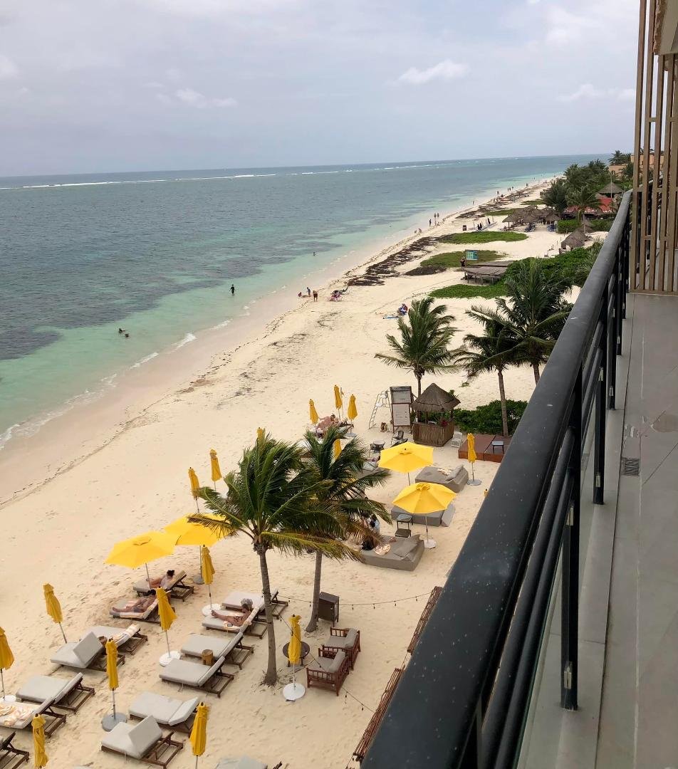 View of the beach from my friends’ balcony terrace at The Fives resort