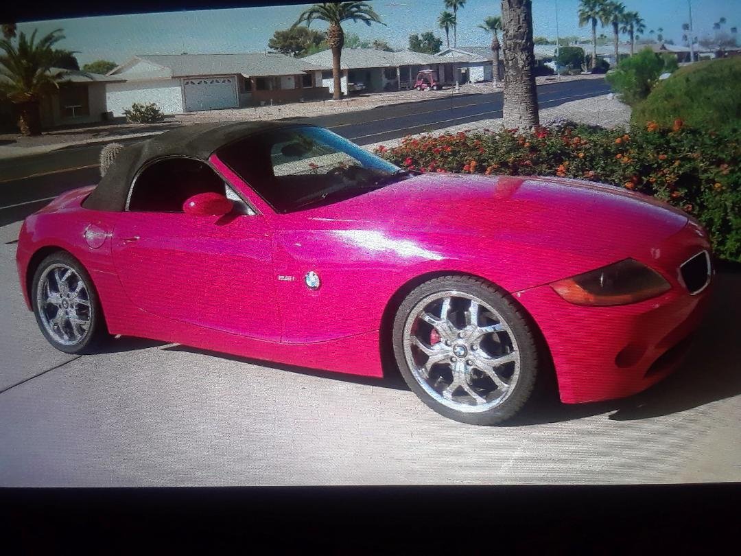 She's not pink! She's red.