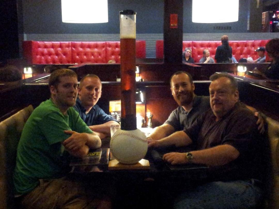 My three sons and the tallest beer I have ever had. It doesn't get any better than this !!