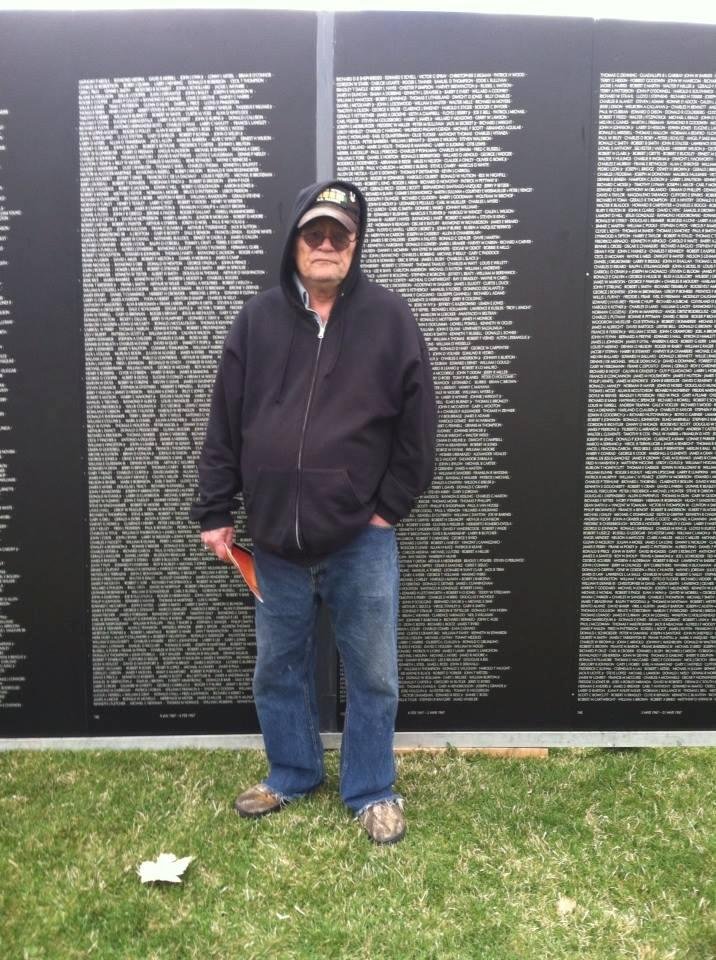 Standing in front of the traveling wall.
