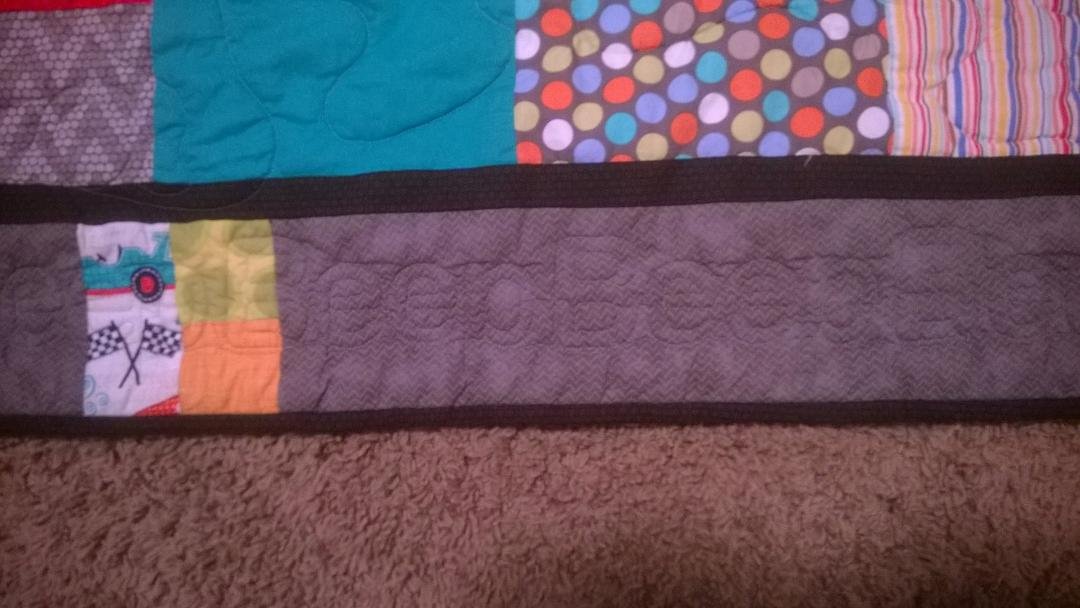 Just a fun quilt and pillowcase for my car and monster truck loving little guy.