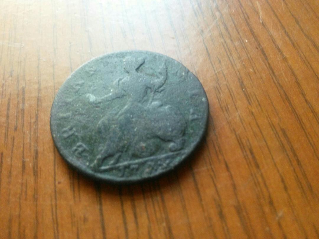 1734 British half pence.