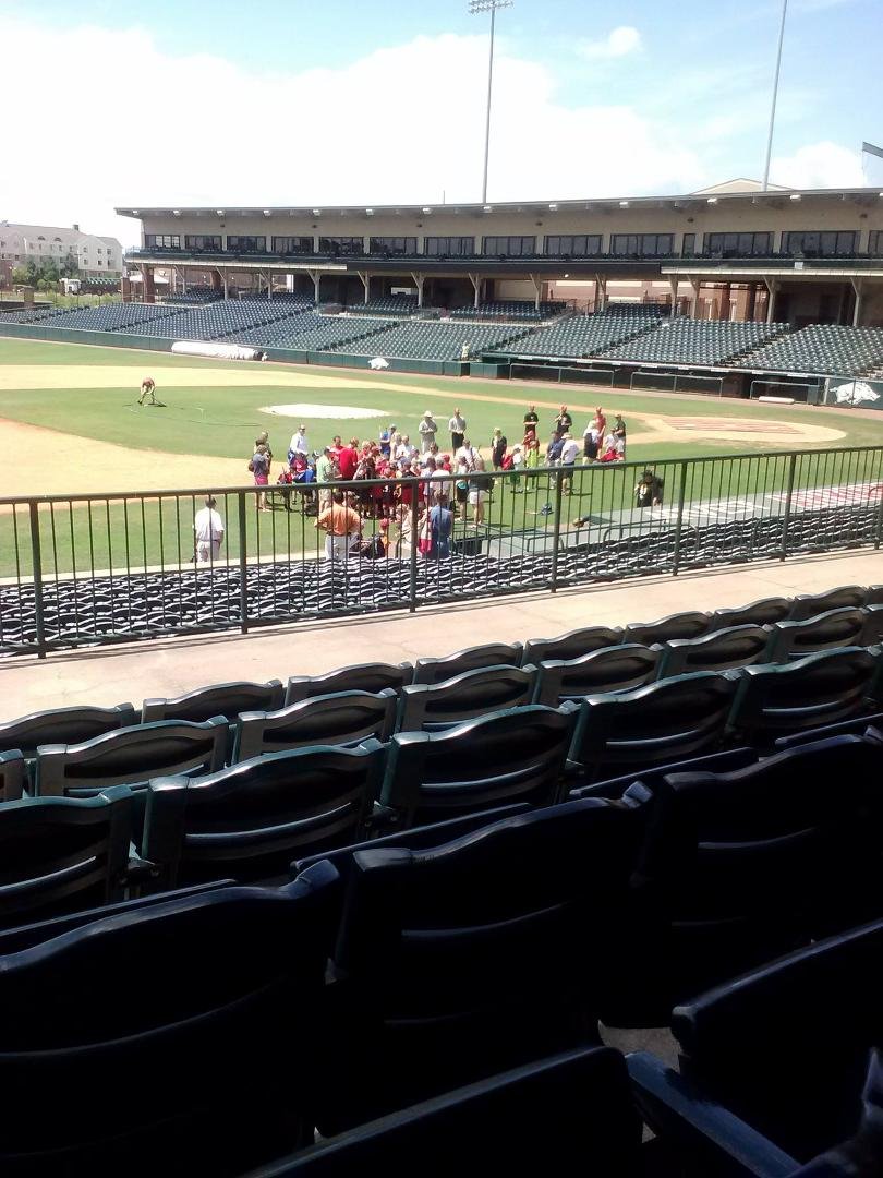 Final day of tazorback baseball carmp. T. spoon signing autographs.