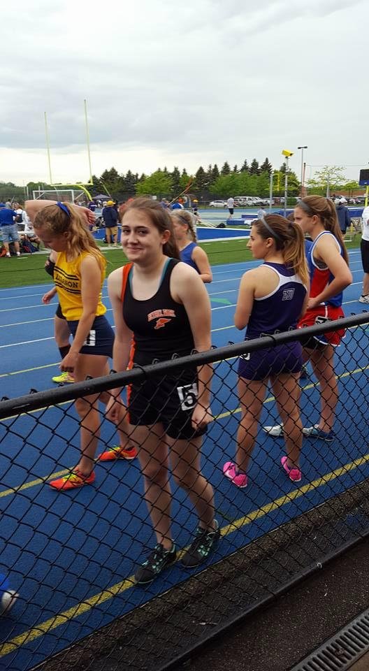 Our daughter Cailey before running the anchor on the 4 × 800 at the WPIAL qualifiers. BP qualified.