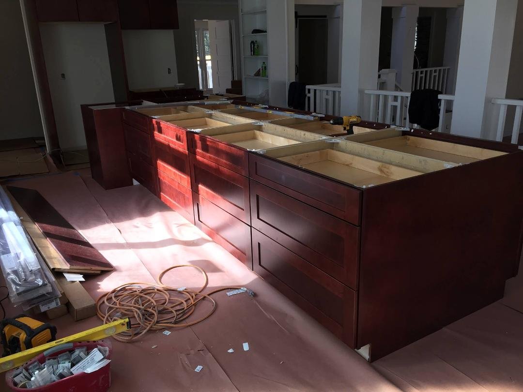 That is all cabinets in place. Wow still lots of room before the room ends.