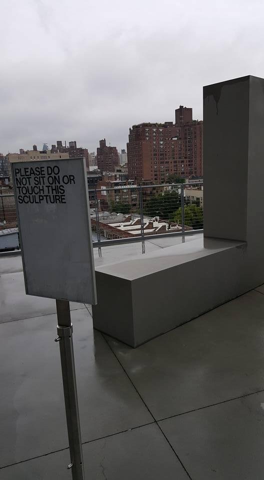 At the Whitney Museum in NYC. Very interesting even for someone who has a complete collection of Dogs Playing Poker. I had to go outside to make a call and didn't see the sign. It's apparently a work of art and not a