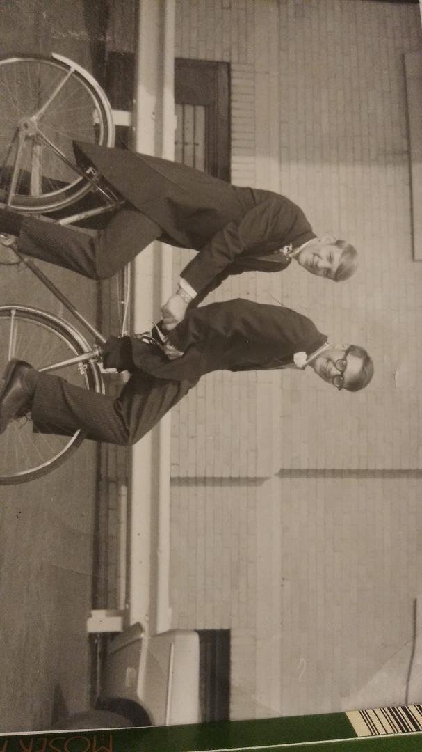 Gettin to the church on time. Car wouldn't start. Cliffy the groom pedaling, and me, best man on the bars. Mt. Carmel church, late 60's. :))
