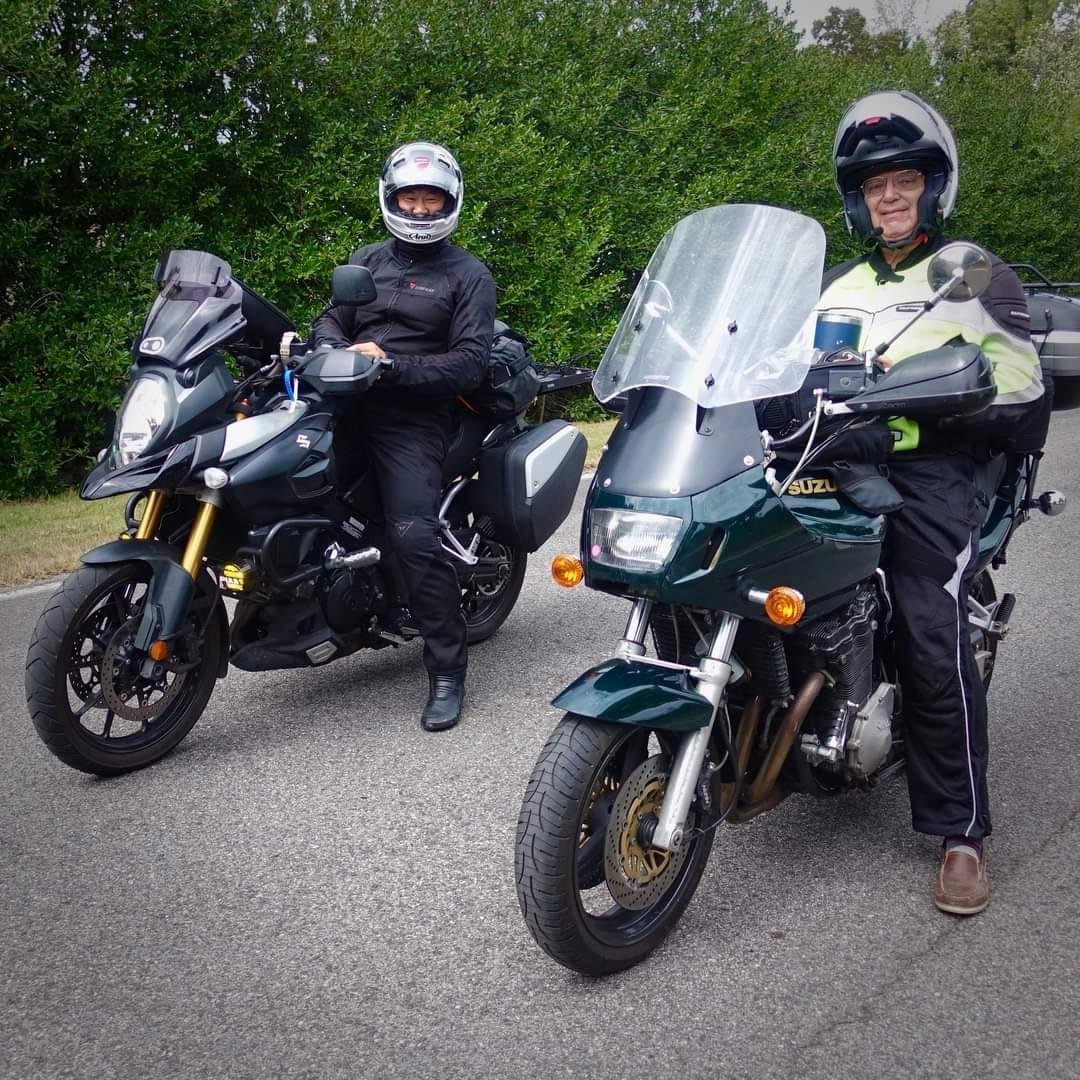 Han and I waiting to ride a few laps on the Barber racetrack. Only Han would notice I forgot to take off my street shoes and change to my riding boots!