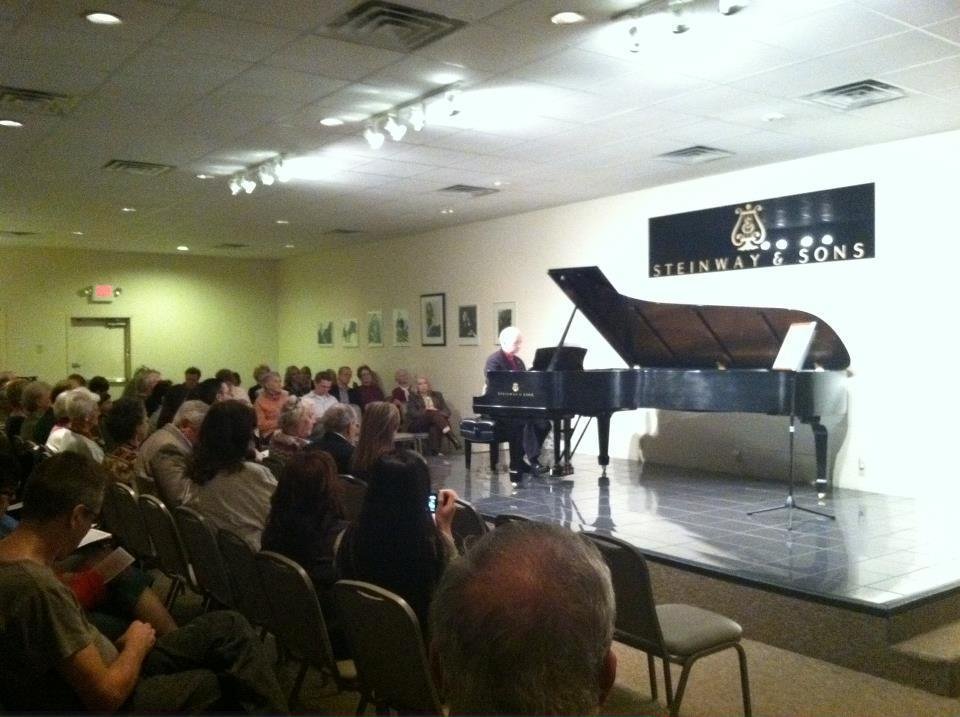 Yesterday I participated in a Celebration of Franz Liszt's 200th birthday!  It was held at Nashville's Steinway Piano Gallery.  In the photo, I am performing NUAGES GRIS.  It was a great event.  I also gave a talk on Liszt'
