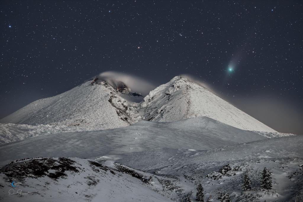 Comet ZTF over Mount Etna
Image Credit & Copyright: Dario Giannobile
Explanation: Comet-like plumes are blowing over the volcanic peaks of Mount Etna in this wintry mountain-and-skyscape from planet Earth. The stacked and