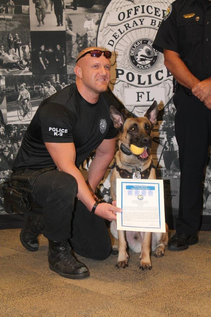 Andy and K-9 Ghost receive Officer of the Quarter Award.
