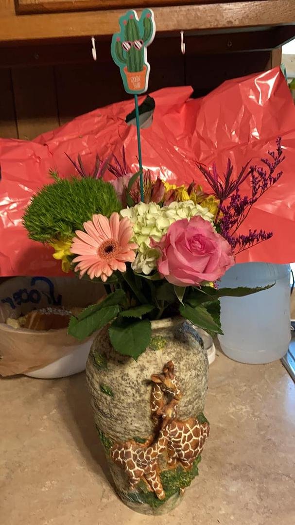 I got my painting helper some flowers!