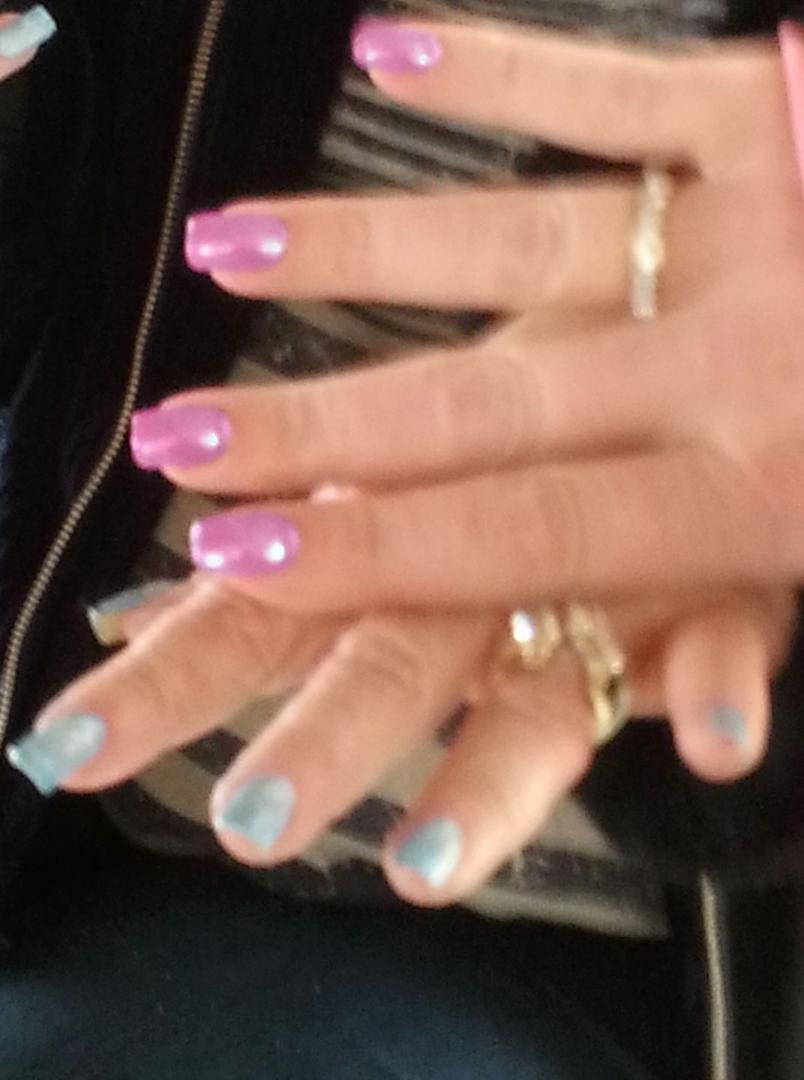 Laura Silver Tanenbaum and Kristin Eylward nail competition at the Tiki.