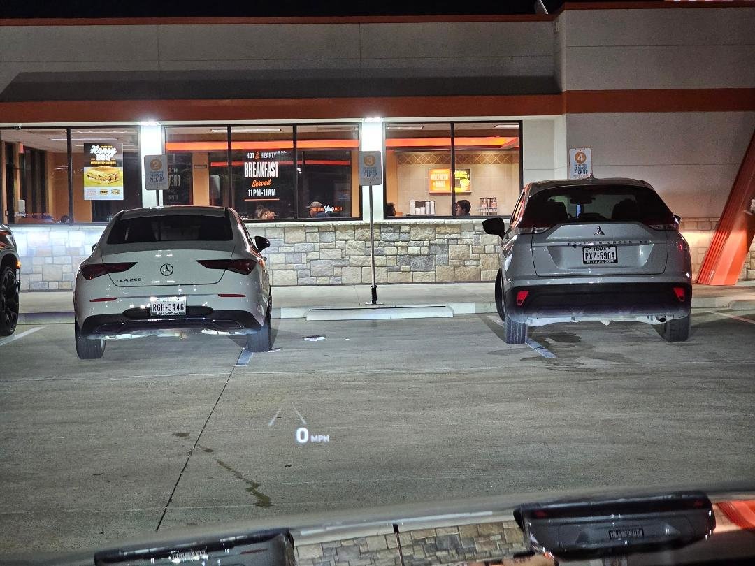 Two parking challenged individuals that blocked the last space.
