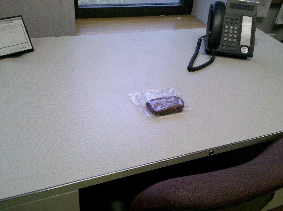 Zuchinni bread with white raisins waiting for me at my desk. Why did I resign again?!