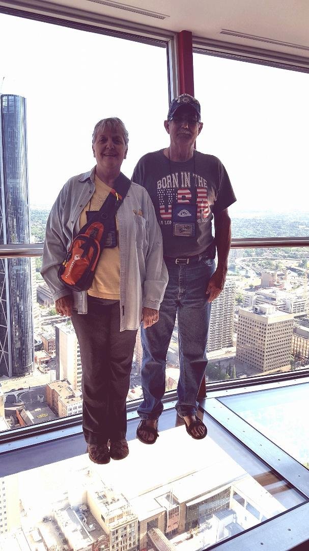 Calgary sky dome,Gene and I on glass platform 800 ft in air.
