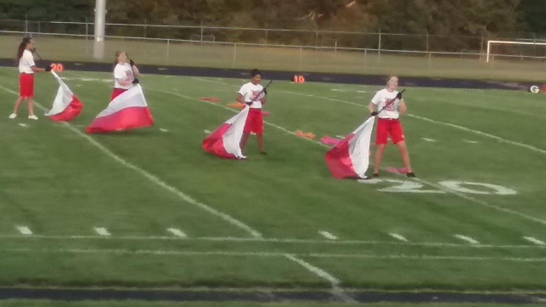 Madison doing flag, RT, at Paw Paw football game.