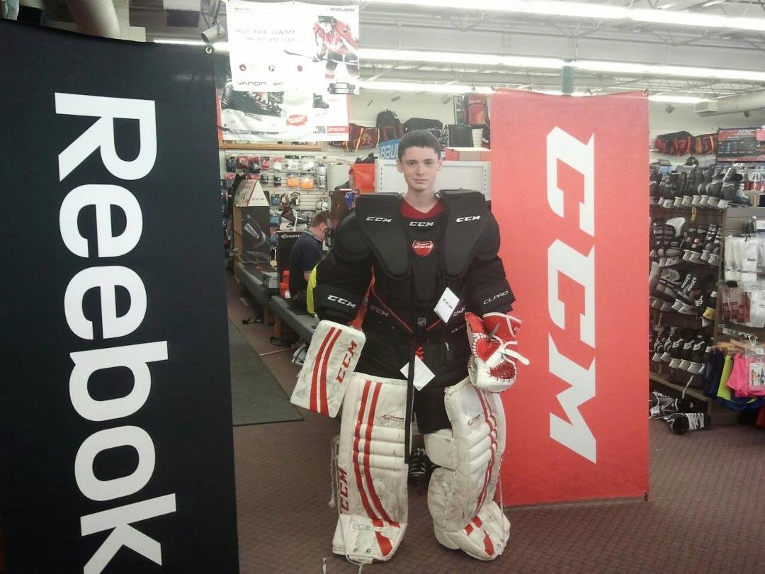 Parker proud as a peacock in his new CCM goalie chest protector and breezers. Looks like a transformer!:-)