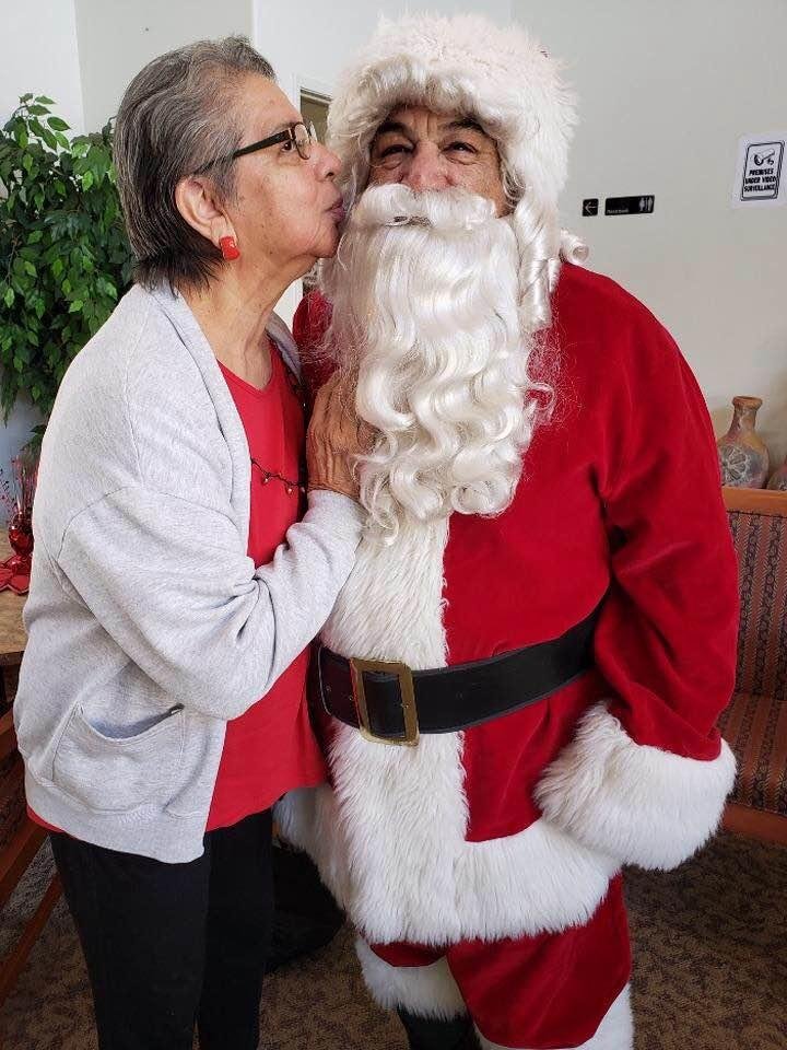 Look who got caught kissing Santa Claus.....