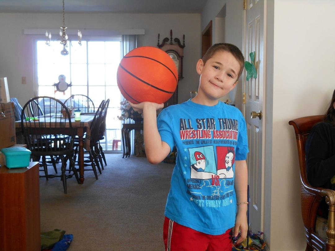 Here is grandson Rhys (7) rubbing it in that he won basketball pool. He had Duke as the winner too. His brother Gavin (9) finished 3rd, also beating out several adults. Congradulations!