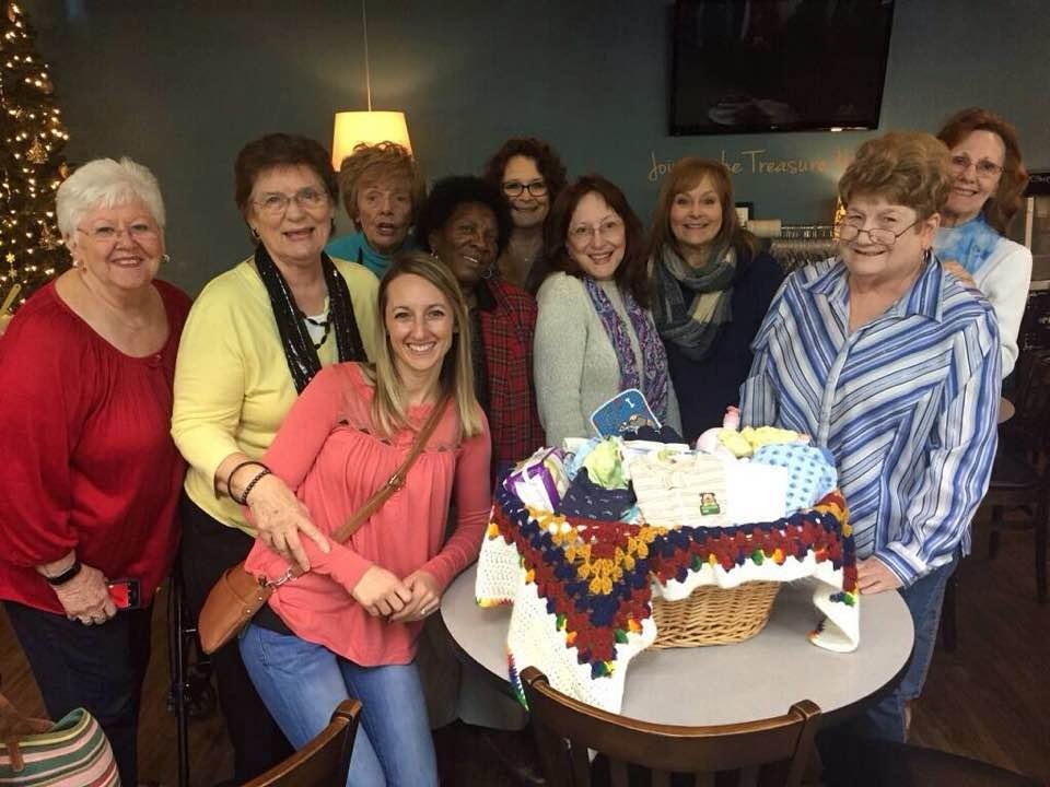 The Friday ladies group, with the help of Ami, being a blessing to a local young mom.