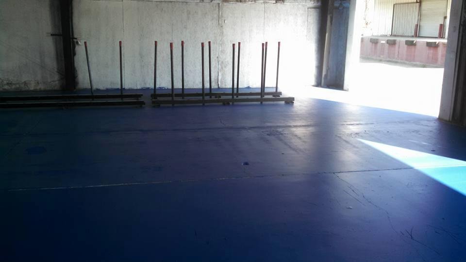 Walls and floors are painted. Row 1 of 4 rows has racks ready for display slabs. Lights go in tomorrow. Getting there. Thanks to Michael, Mitchell and my copilot for 26 years Ramon. This dream is starting to become th