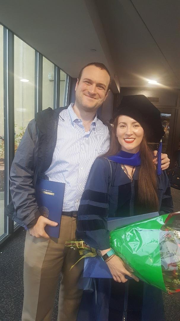 Yesterday was WVU's Fall/Winter graduation. My daughter Rachel officially got awarded her PhD in Chemistry. Here's a picture of her in cap, gown and Arts & Science PhD hood with her hubby - Vince.