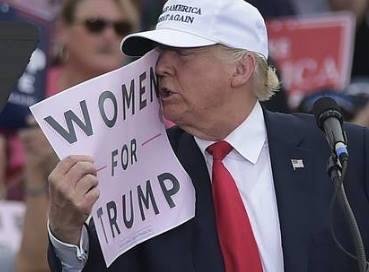 Damn ... even making unwanted advances on a sign! Looks like he's ready to lick it. What a guy.