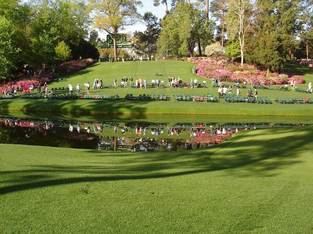 Standing to the right of 16th green looking across the pond.