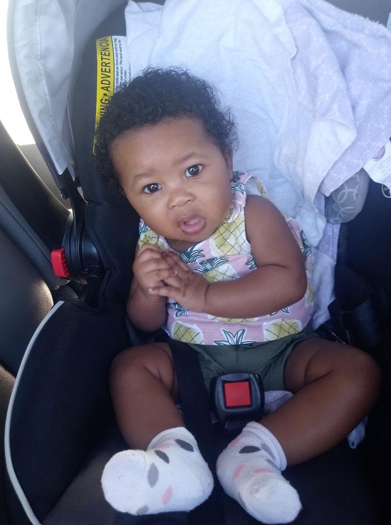 My youngest grandchild chilling with me