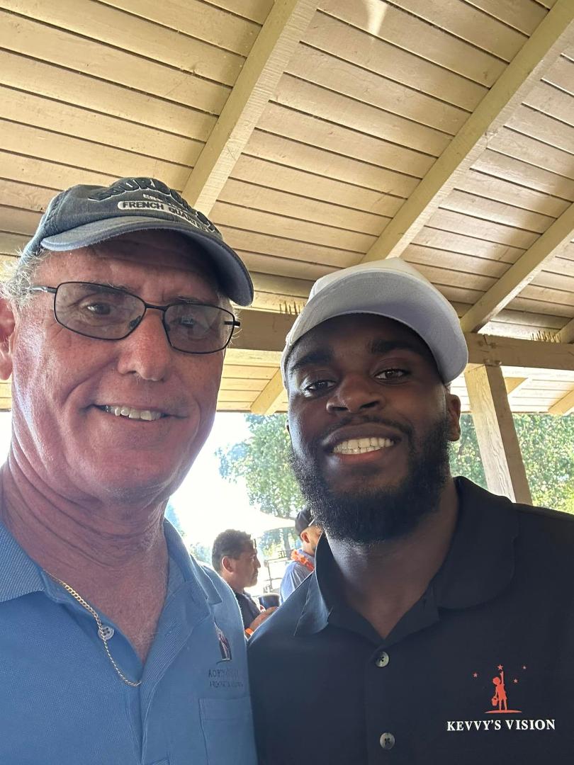 Jaylen Johnson and myself. Jaylen played football and basketball at Central high in Fresno where I officiated his games. He is now playing for Chicago Bears and was named All Pro. Great person I am proud to know him and b