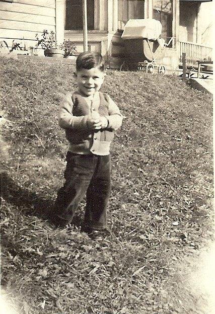 Me about 1943 or 1944 at 6 Brown St Marlboro. This looks like the side of the house that ran parallel with main st. On the left side of the picture was the side door that entered into the Kitchen. It was that door where