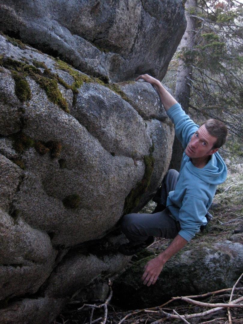 PJ bouldering in the park on ancient glacial erratics that are scattered throughout the park and the Serra Nevada Mountain range.
