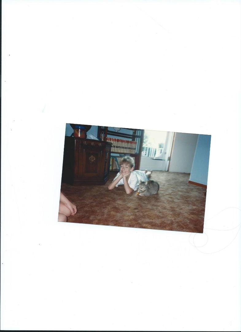 This a picture of my cat Tabatha and my friend from my childhood Sarah Hatfield Strigari who is now a mother of twins herself. It just seems like yesterday that we were playing together and I was watching her at the same ti