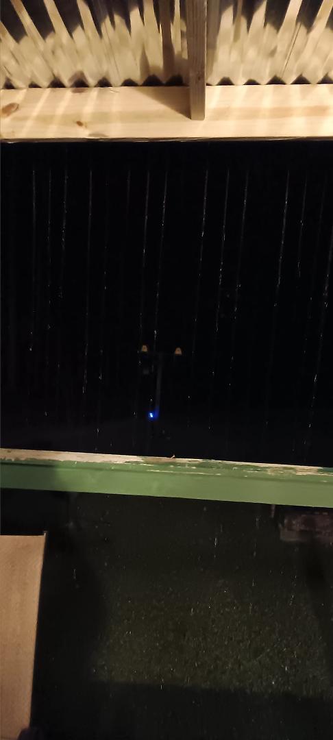 The rain is so pretty coming off my new roof!